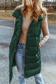 Green longline hooded puffer vest with zip front and pockets