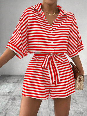 Red and white striped shirt romper with button front and self-tie belt.