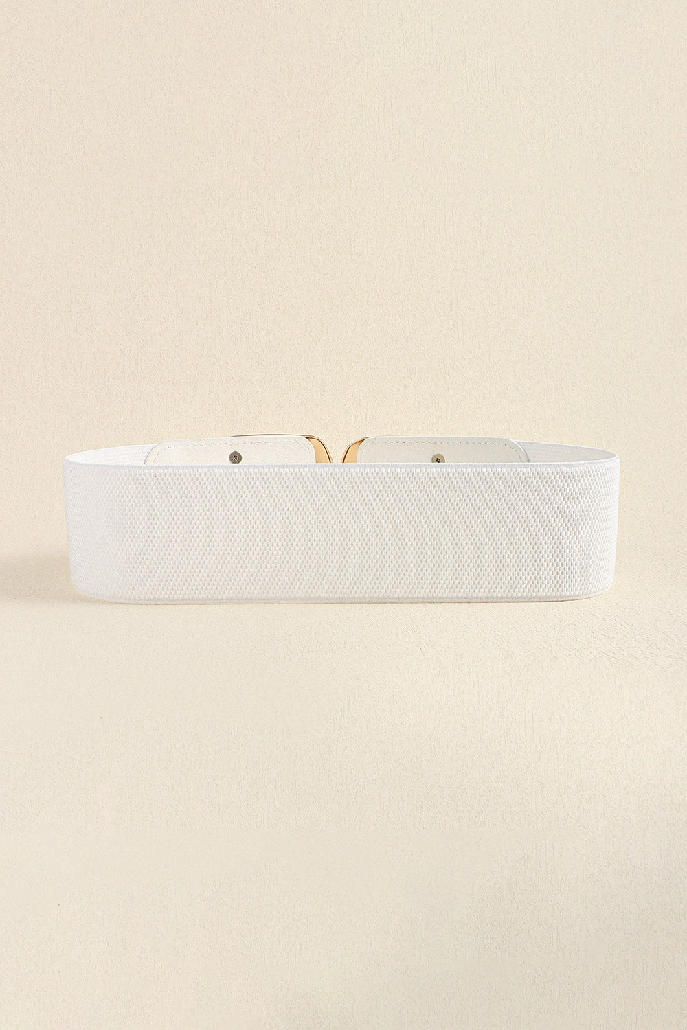 White elastic waist belt with double C buckle and gold hardware detail