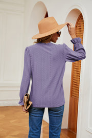 Lilac perforated sleeve blouse with ruffle cuffs and eyelet detail.