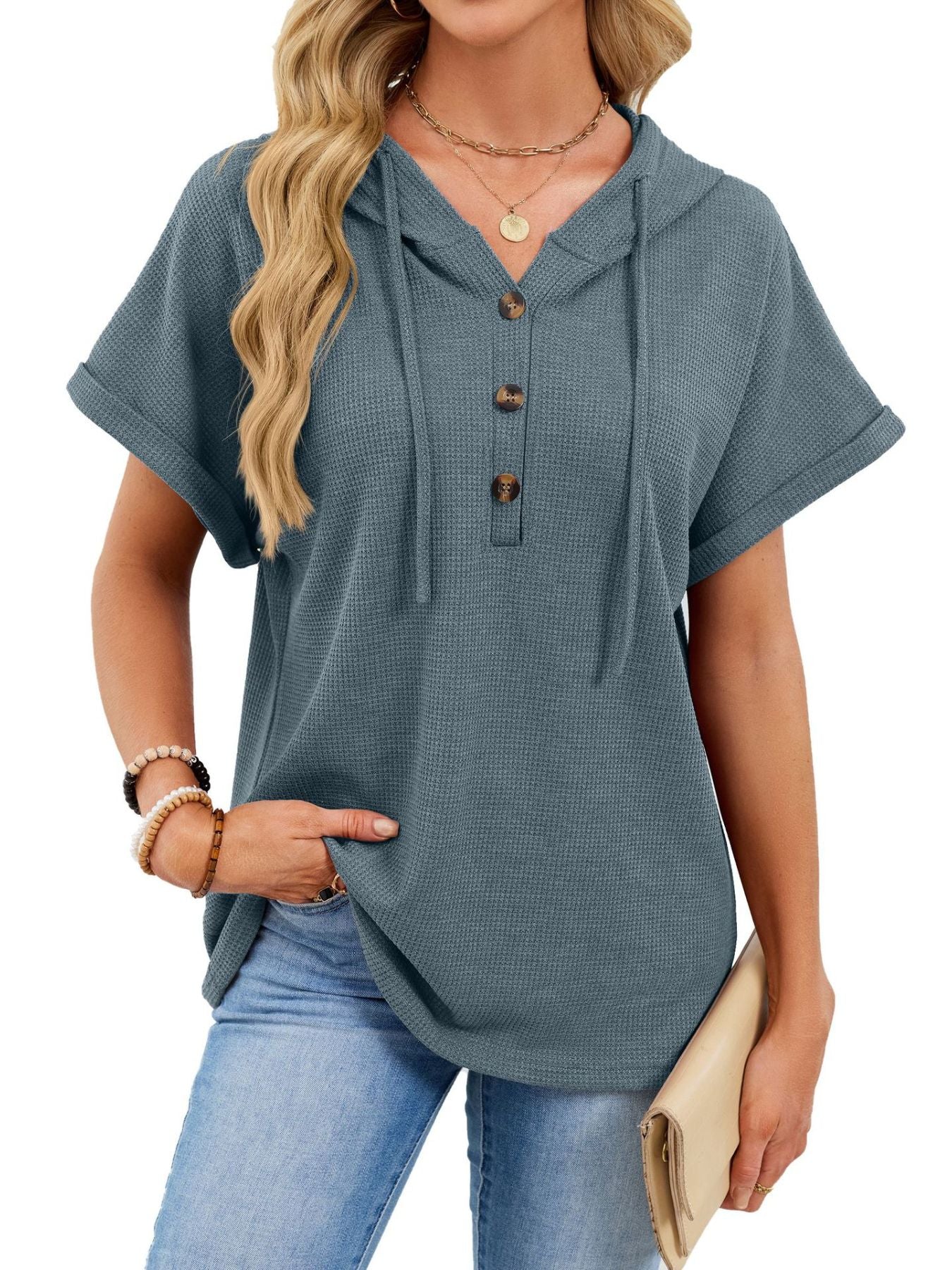 Blue gray waffle knit short sleeve hooded top with button placket and drawstring.