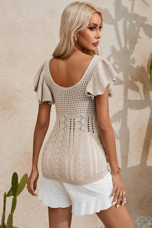 Tan crochet knit top with flutter sleeves and intricate openwork detail.