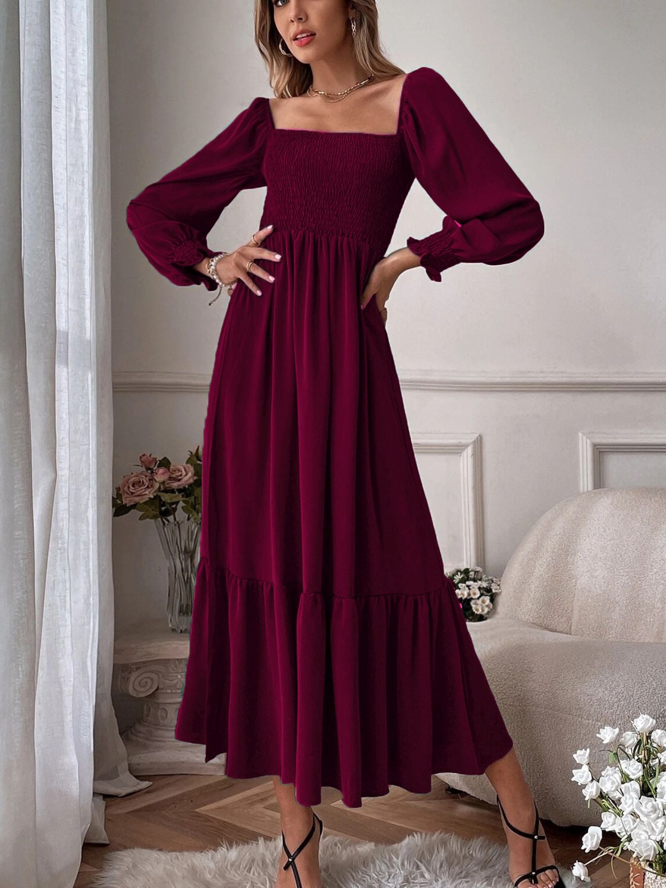 Burgundy midi dress with smocked bodice, square neckline, puff sleeves, and tiered ruffled hem.