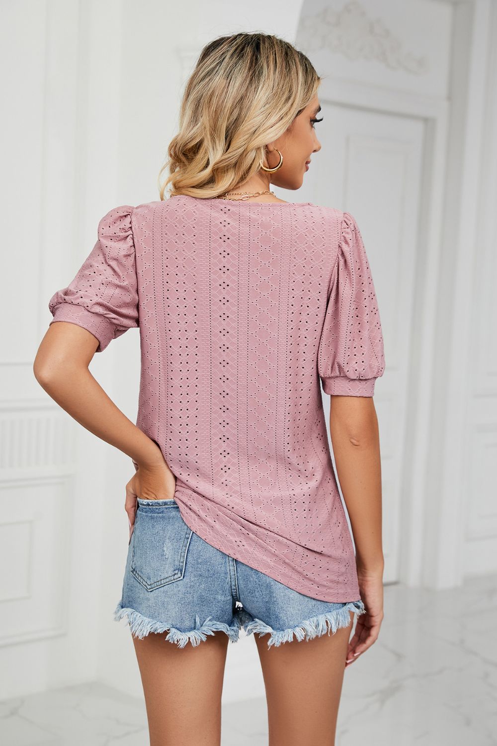 Pink eyelet puff sleeve scoop neck blouse with textured pattern