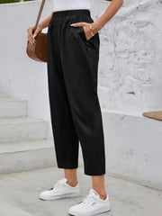 Black textured elastic waist cropped trousers with button detail