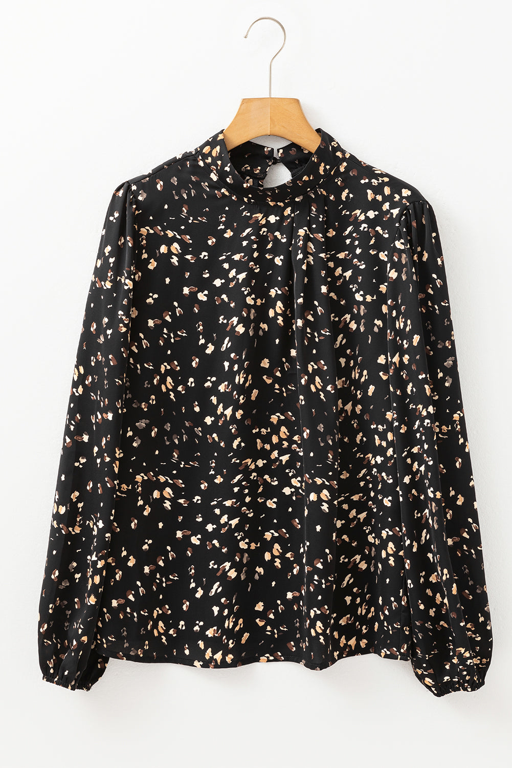 Black abstract print high-neck blouse with keyhole detail and long sleeves