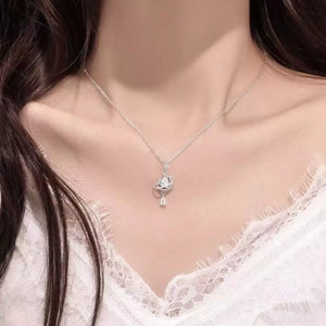 Celestial Heart Pendant Necklace with crystal accents on a silver chain.