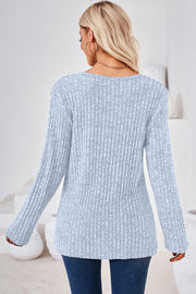 Light Blue ribbed knit sweater with long sleeves and a crew neck.