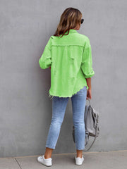 Green Apple distressed denim shacket with frayed hem and cuffs, casual trucker jacket style.