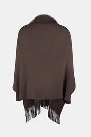 Chocolate faux fur trimmed fringe cape with a knit texture.
