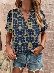 Americana Henley print top with floral pattern, v-neck, and button detail.