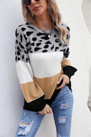 Leopard Patchwork Balloon Sleeve Knit sweater in grey, white, tan, and black acrylic.