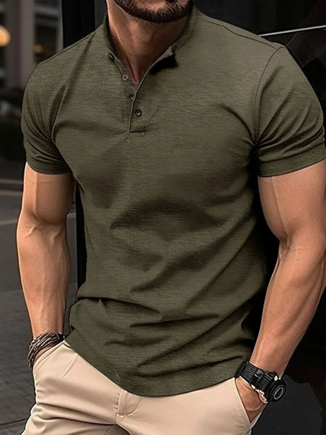 Army green Mandarin collar henley polo shirt with buttoned placket and short sleeves.