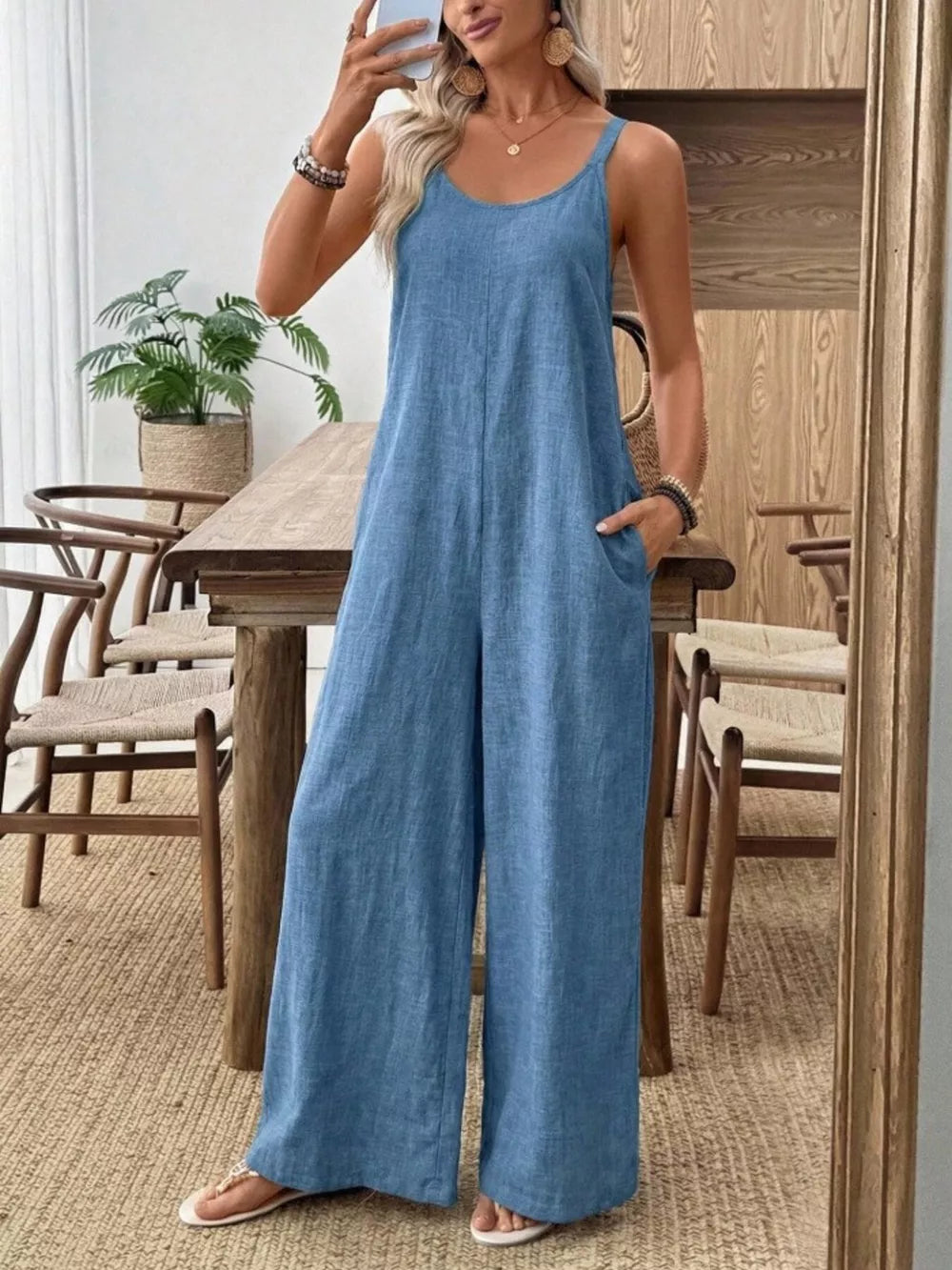Spaghetti Strap Wide Leg Jumpsuit in Dusty Blue, model styling view