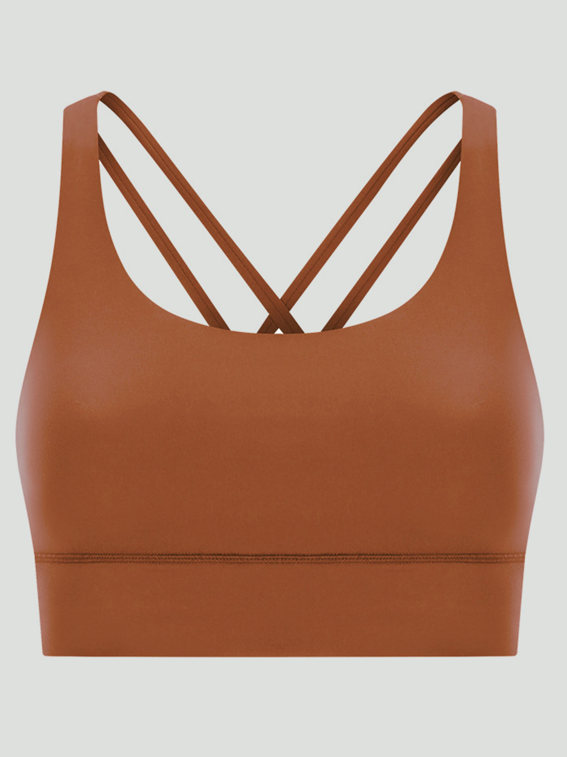 Caramel sports bra with crisscross back straps and a scoop neckline.