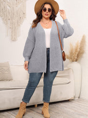 Chunky knit cardigan in Cloudy Blue with balloon sleeves and a V-neck.