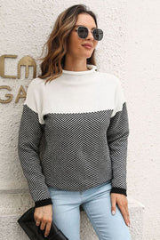 Chevron block mock neck knit sweater in black and white acrylic with chevron pattern.
