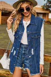Distressed dark denim sleeveless jacket with frayed hem and button front.