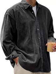 Men's dark gray corduroy button-up shirt with classic collar and long sleeves.