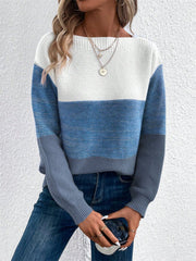 Colorblock boatneck knit sweater in white, blue, and gray acrylic with ribbed cuffs.