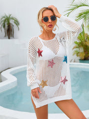 White open knit beach cover-up with sequin stars, long sleeves, and crew neck.