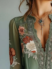 Green floral embroidered lace blouse with deep V-neck and bishop sleeves.