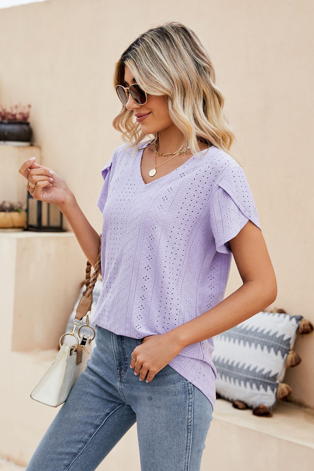 Lavender perforated sleeve detail knit top with V-neck