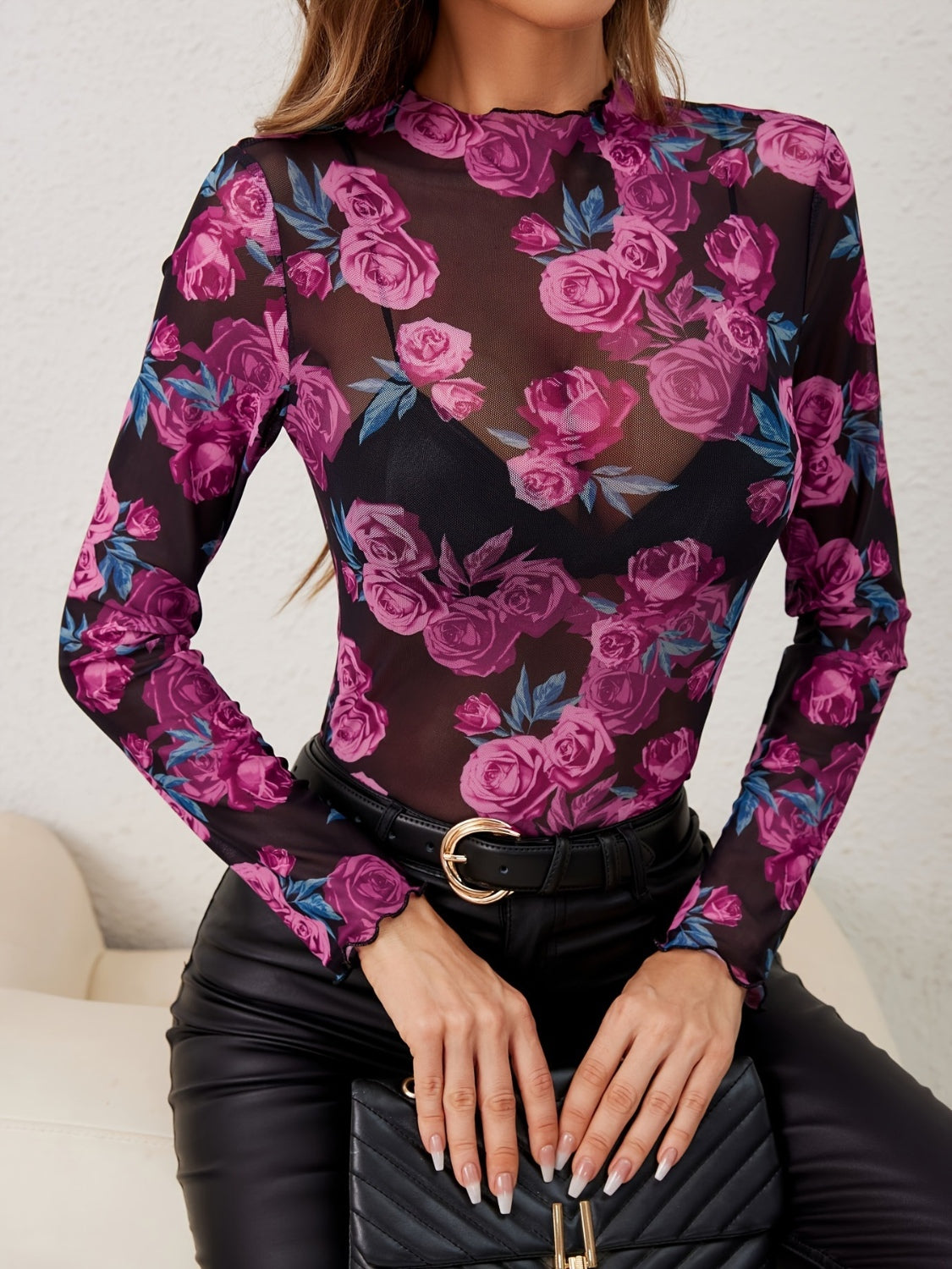 Floral mesh long sleeve top with lettuce trim neckline and cuffs.