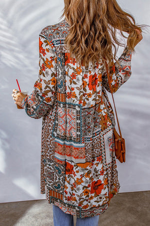 Patchwork print duster shirt jacket with button front and long sleeves.