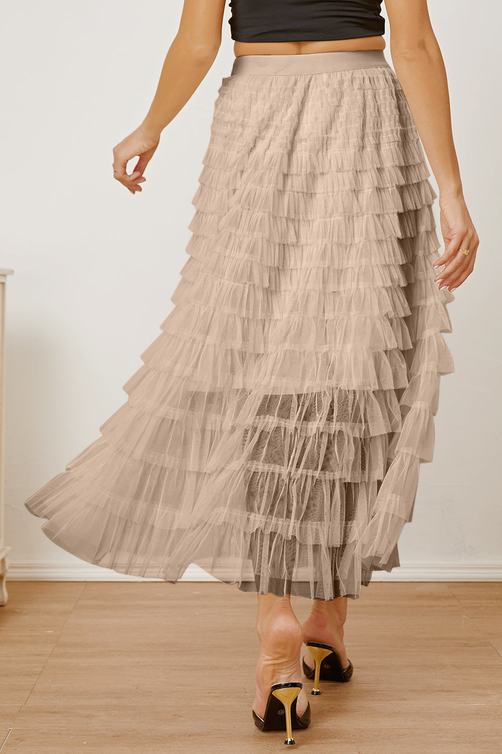 Tiered tulle maxi skirt in khaki with ruffled layers and a flowing silhouette.