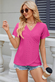 Hot Pink eyelet wrap v-neck top with short sleeves and a crossover front.