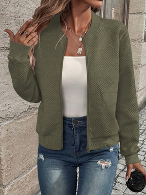 Army green geometric quilted bomber jacket with zipper closure and ribbed cuffs.
