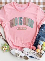 Blush pink crewneck t-shirt with "GOD IS GOOD ALL THE TIME" graphic print.