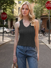 Black cable knit tank top with V-neck and sleeveless design.