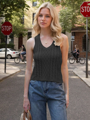 Black cable knit tank top with V-neck and sleeveless design.