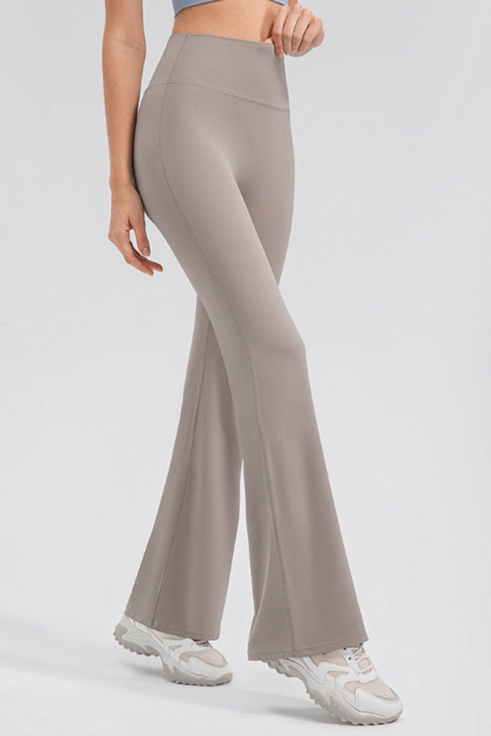 Sculpted flare leggings in tan with a high waist and performance fit.