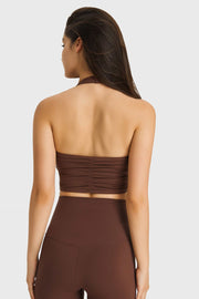 Brown halter neck sports bra with ruched back detail