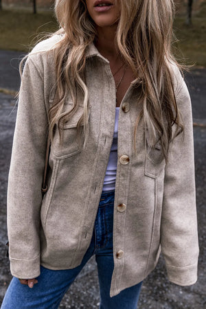 Fleece utility shirt jacket in Dust Storm with button front and chest pockets.