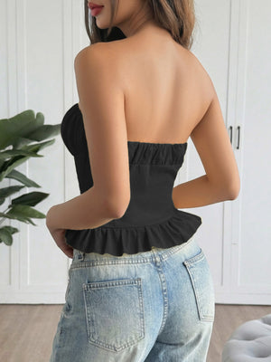Black strapless tube top with ruffled hem and neckline detail.