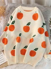 Cream knit sweater with allover orange fruit pattern, crew neck, long sleeves.