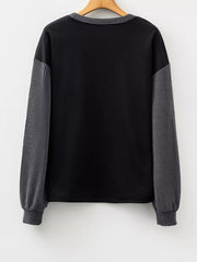 80% polyester, 20% cotton Care instructions: Machine wash cold t-shirt in Black with relaxed silhouette