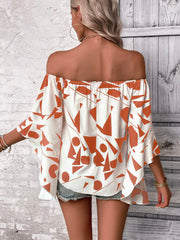 Geometric print off-shoulder blouse with flared sleeves in white and orange.