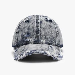 Acid wash frayed denim baseball cap with distressed details and raw edge brim.