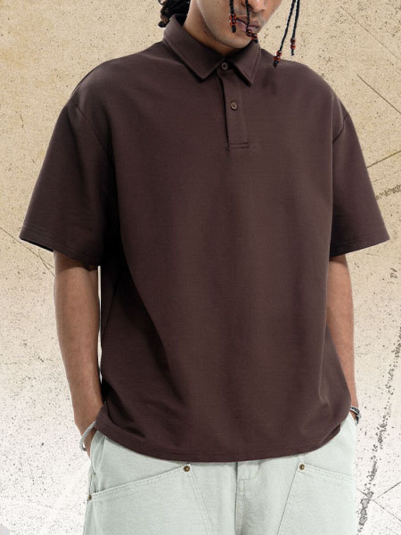 Brown cotton polo shirt with buttoned placket and short sleeves