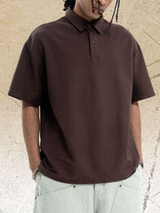 Brown cotton polo shirt with buttoned placket and short sleeves