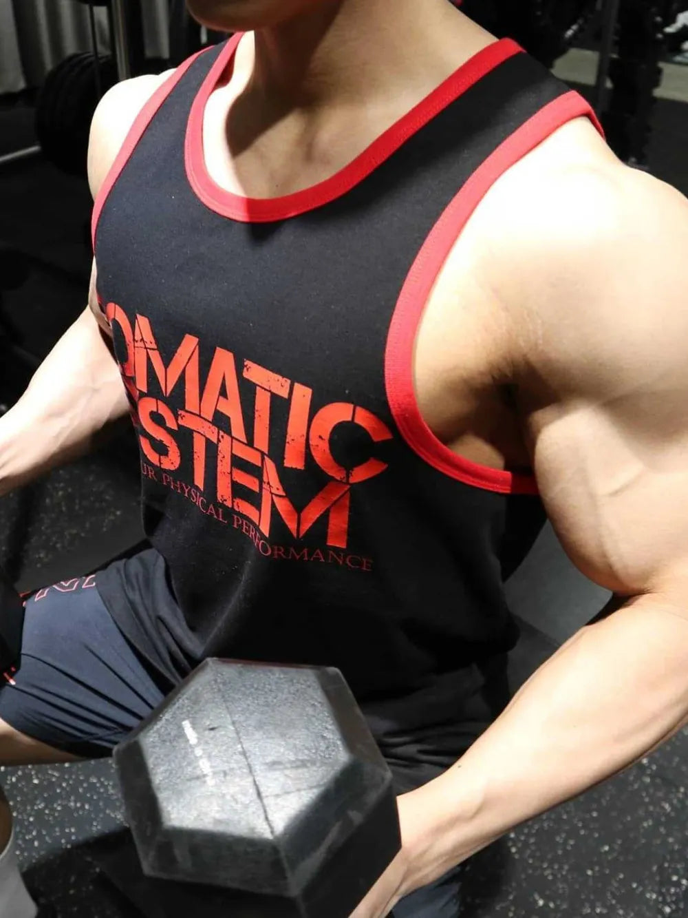 Black Somatic System graphic tank top with red trim, athletic fit.