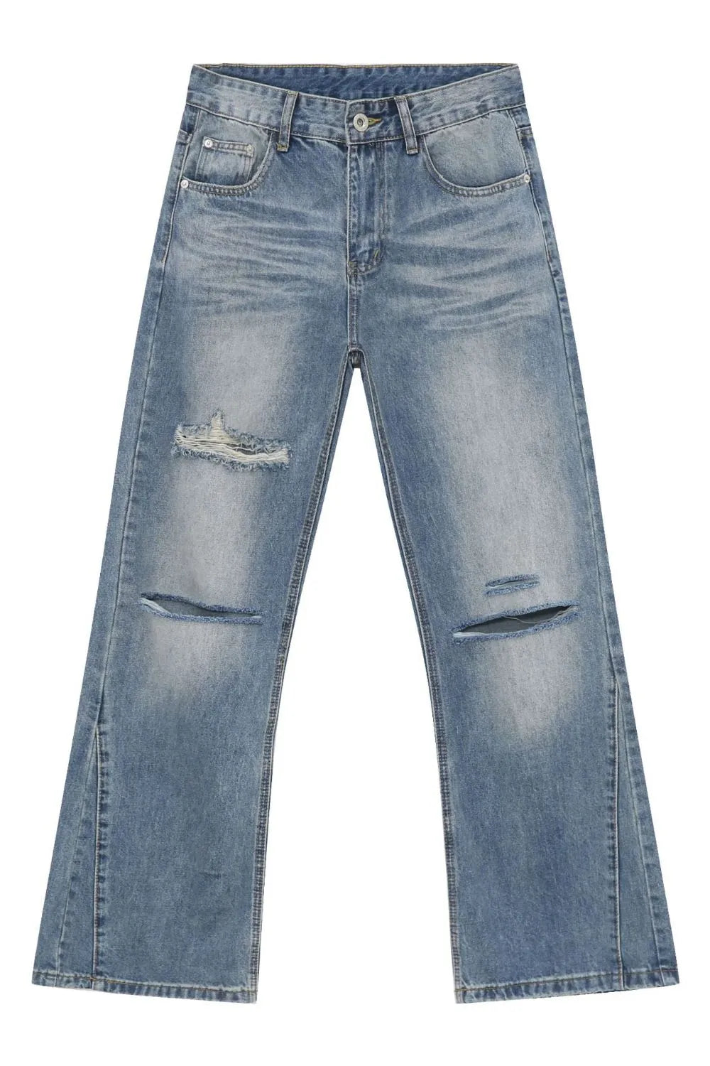 Distressed flare-leg jeans in medium wash denim with ripped details and a split hem.