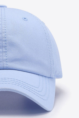 Sky Blue canvas baseball cap with stitched details and curved brim.