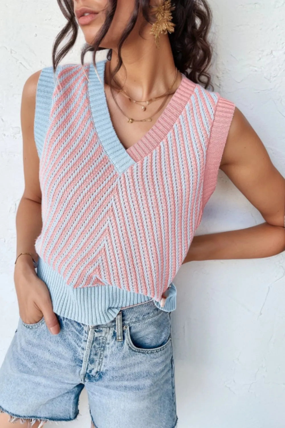 Chic Vibe Sweater Vest in blush pink and light blue knit with chevron pattern and V-neck.