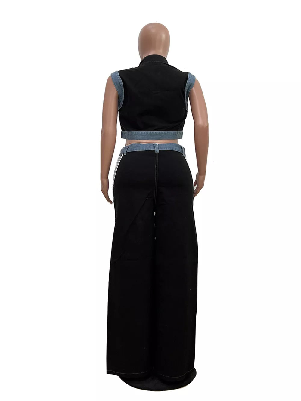 Black zip-front crop top and wide-leg pants set with denim accents.